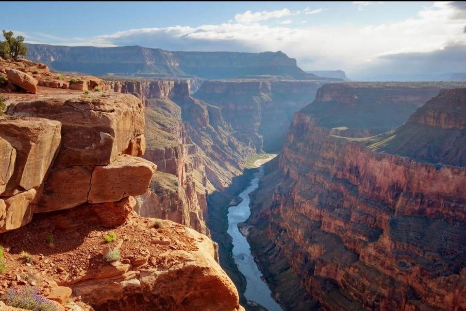 Sunset over Grand Canyon with Colorado River.