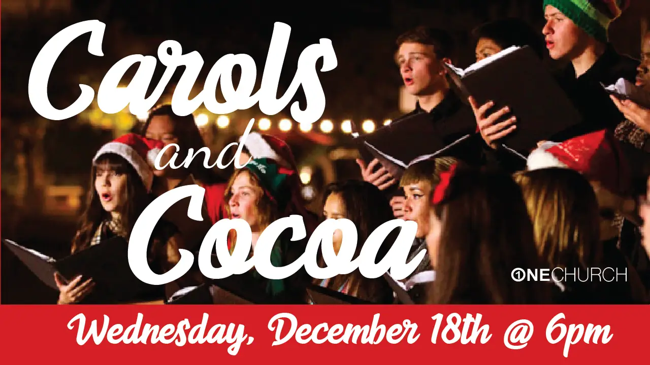 Choir singing at Carols and Cocoa event.